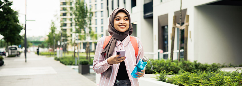 Woman shopping online on a smartphone