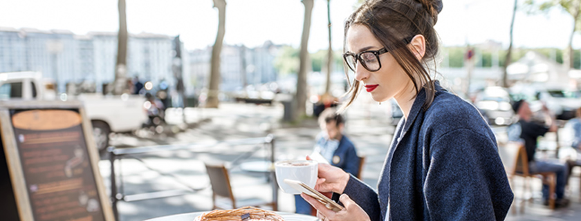 Woman researching on her phone