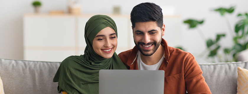 Colleagues reviewing Arabic content together