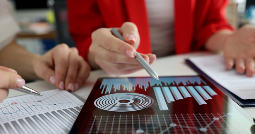 Team reviewing Google Analytics data on tablet